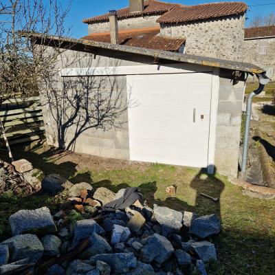 création et pose d'une porte de garage coulissante